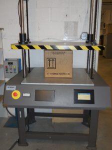 A packaging machine inside a company packing boxes