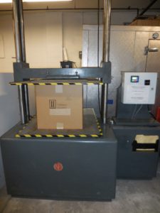 A packaging machine inside a company packing boxes